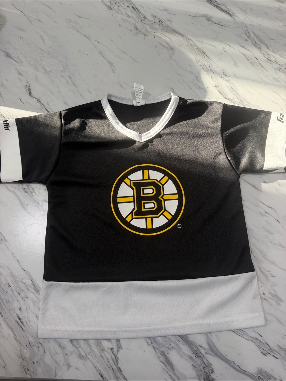 Kids Black & White Hockey Jersey with Yellow Team Emblem